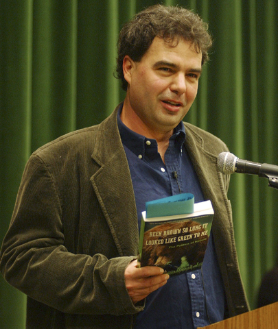 St. Clair book-Co-editor of Counterpunch and author Jeffrey St. Clair holds his book, "Been Brown So Long It Looked Like Green To Me" as he discusses The Politics of Nature at Cal Poly Pomona January 21, 2004.