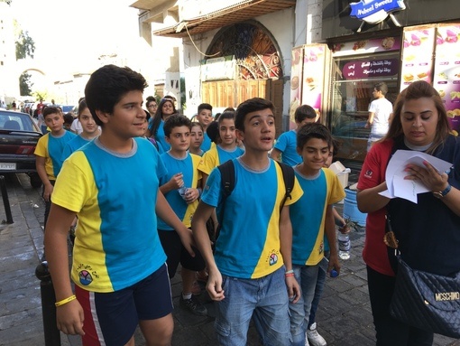 Young Syrian kids on a guided tour through streets of Old Damscus on a weekend