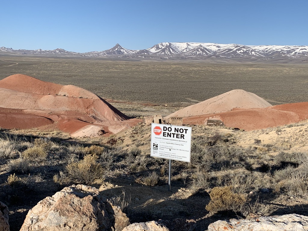 A sign in the desert Description automatically generated with medium confidence