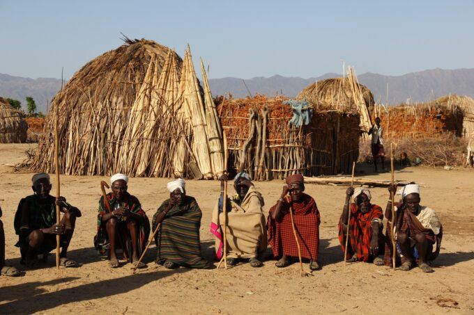 Image of men sitting.