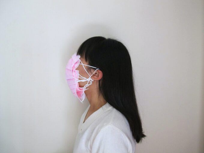 Image of girl in face mask.