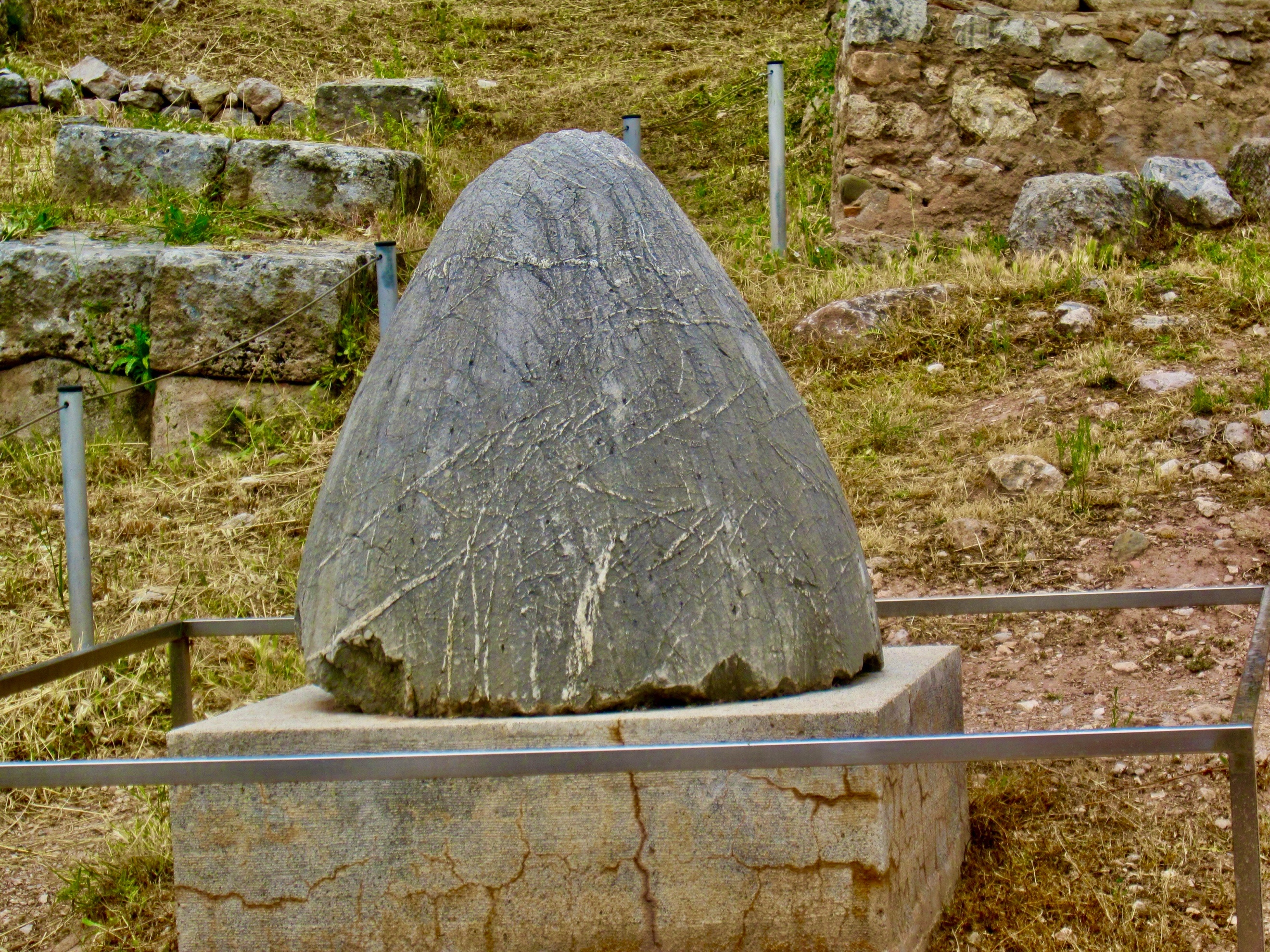 A large rock on a stand Description automatically generated