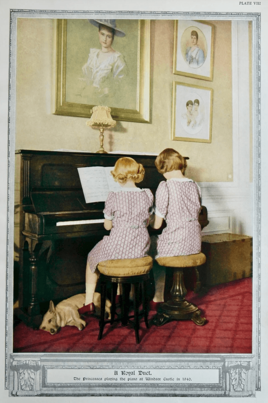 Two girls sitting at a pianoDescription automatically generated