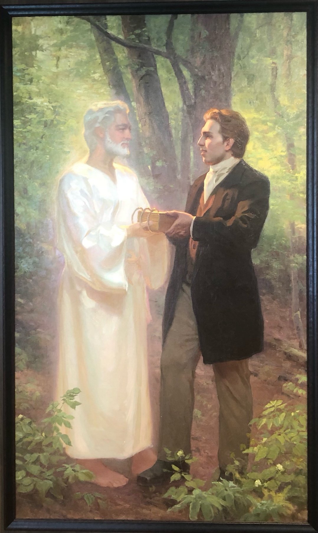 A painting of a person holding a box with a person in a white robeDescription automatically generated