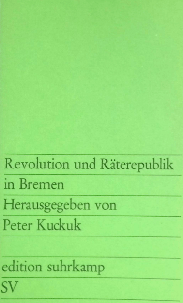 A green book with black text Description automatically generated