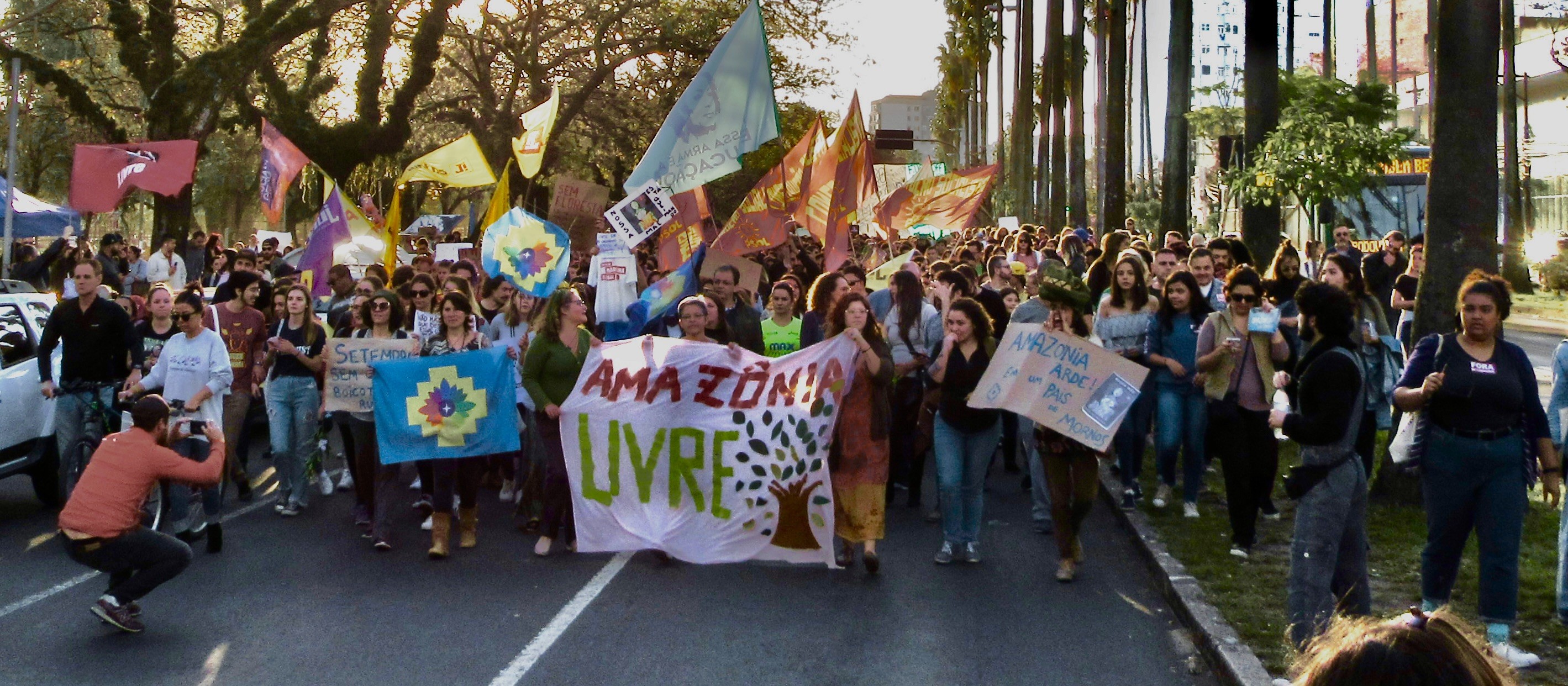 A group of people marching in a street AI-generated content may be incorrect.