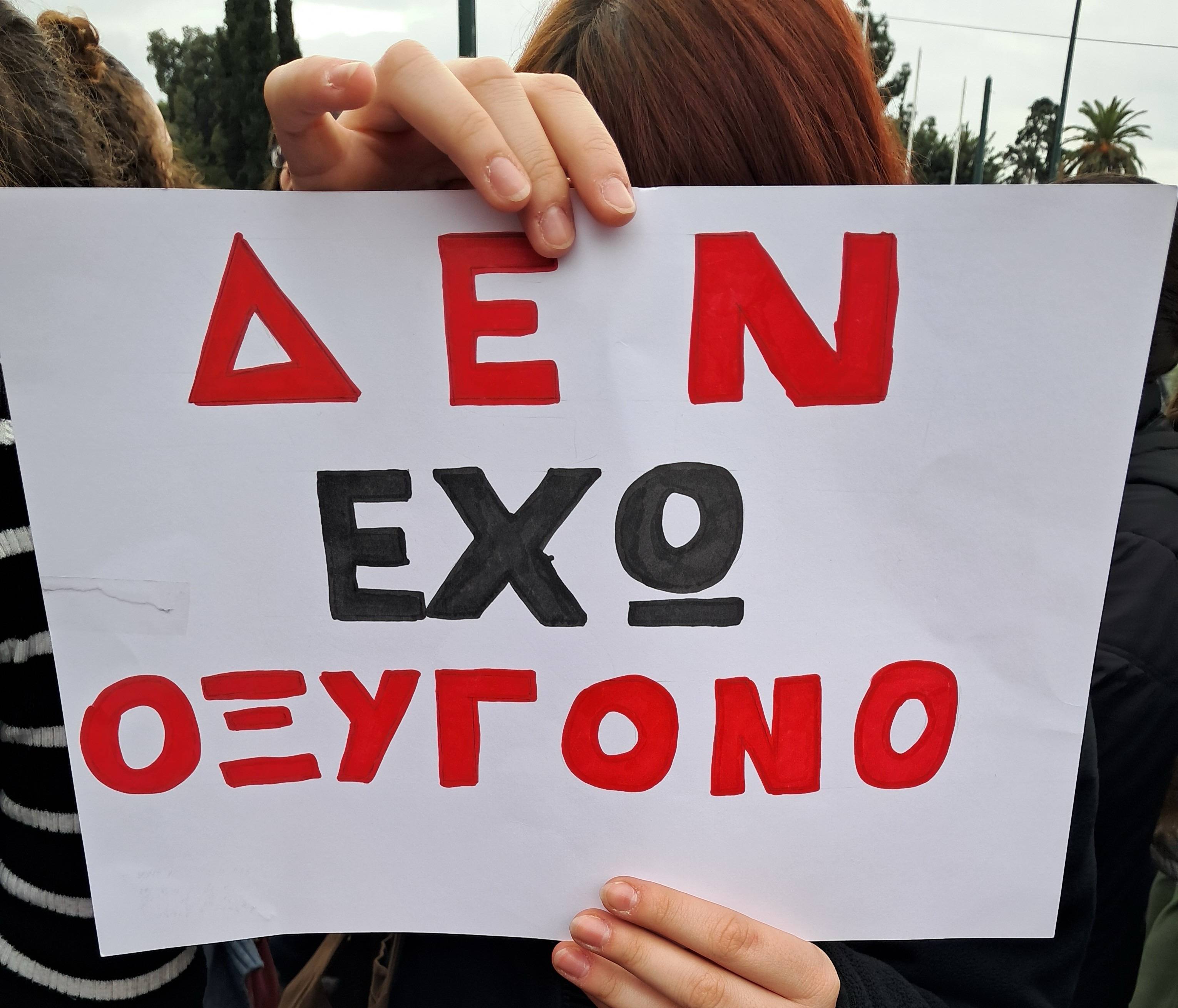 A person holding a sign AI-generated content may be incorrect.