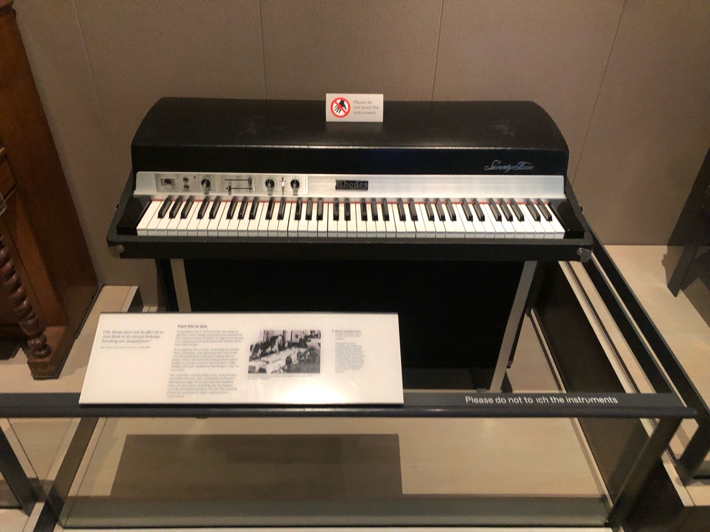 A piano on a glass table AI-generated content may be incorrect.