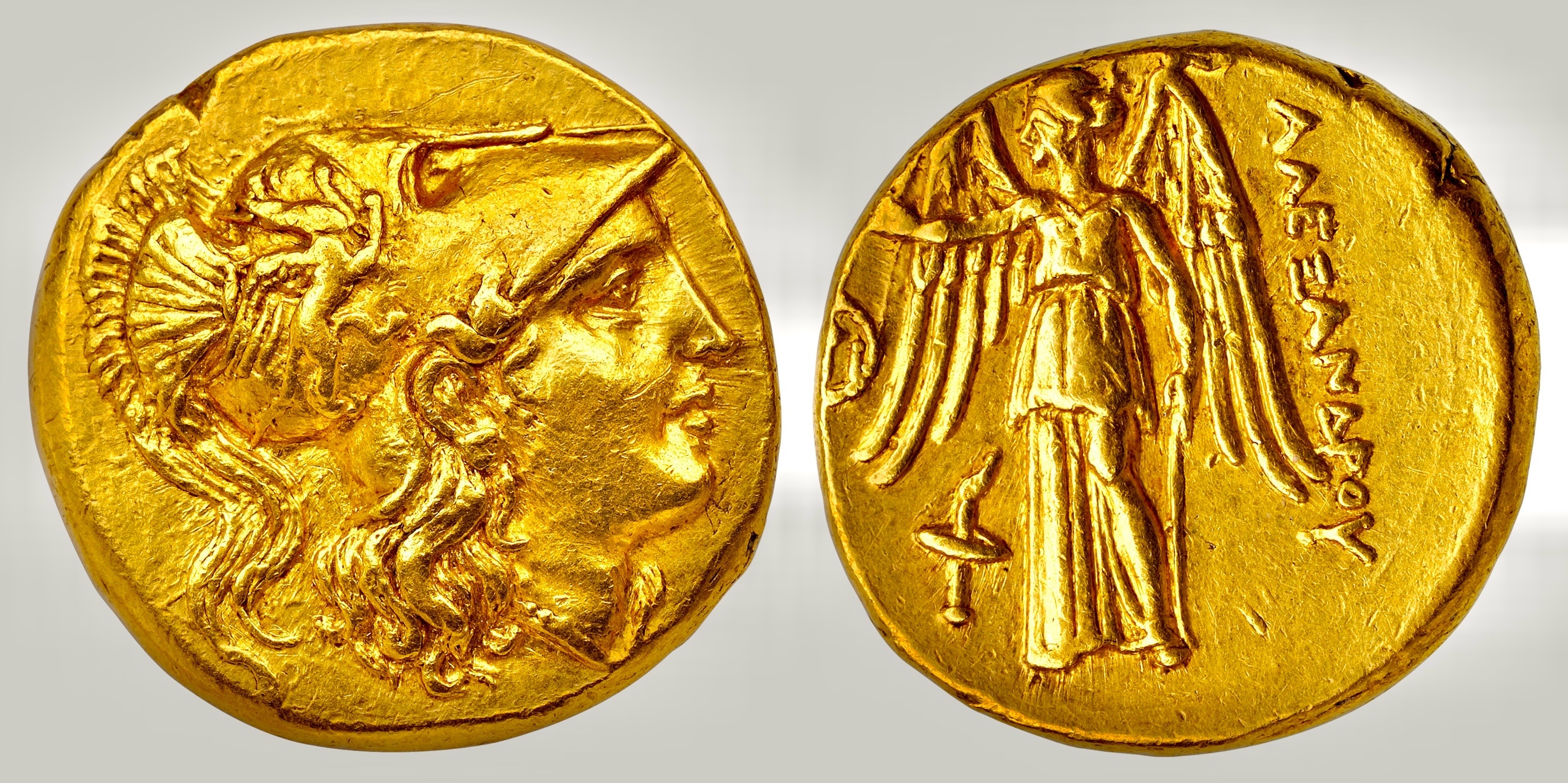 A gold coin with a picture of two people AI-generated content may be incorrect.