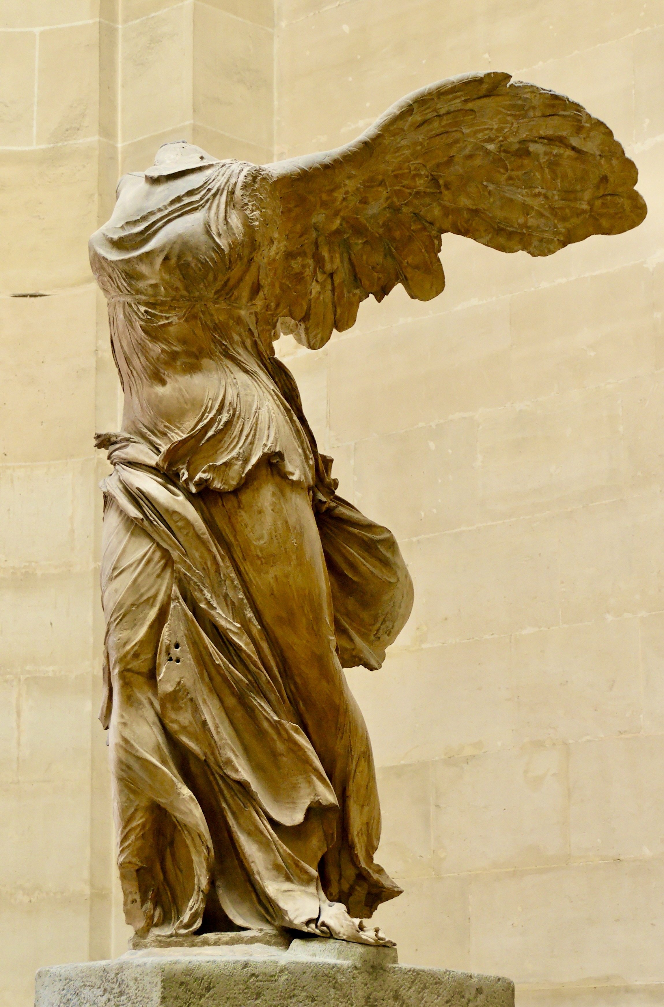 A statue of a person with wings AI-generated content may be incorrect.