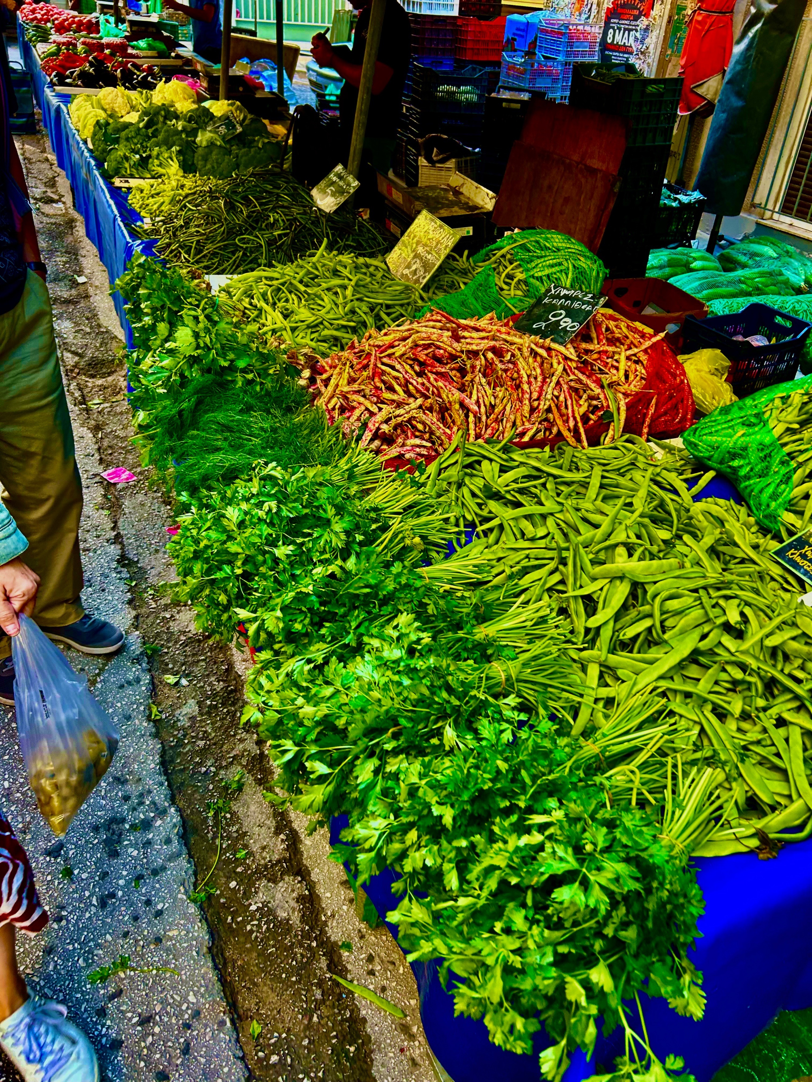 A market stall with various vegetables AI-generated content may be incorrect.