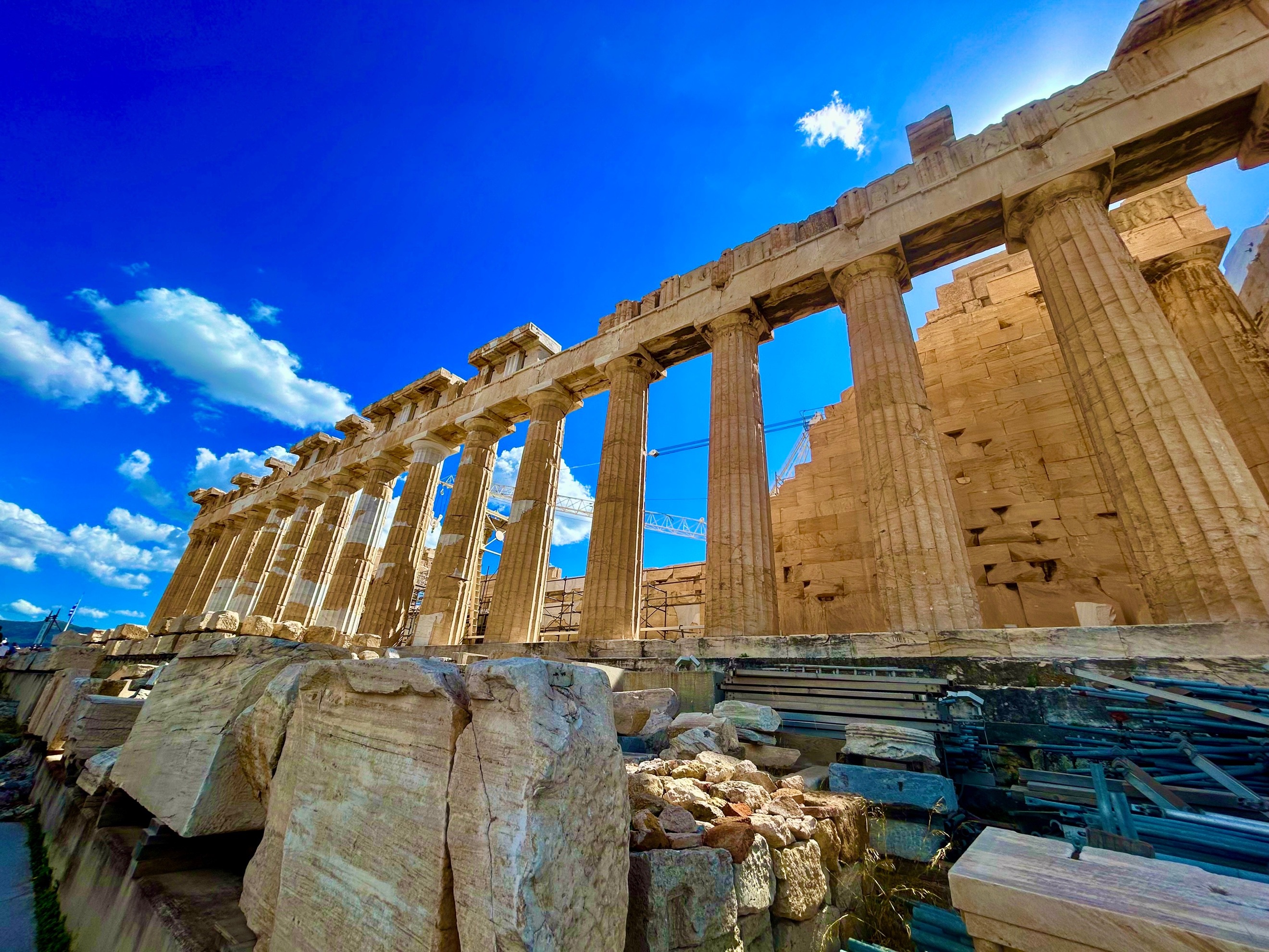 A stone building with pillars AI-generated content may be incorrect.