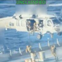 A helicopter with people in the back AI-generated content may be incorrect.