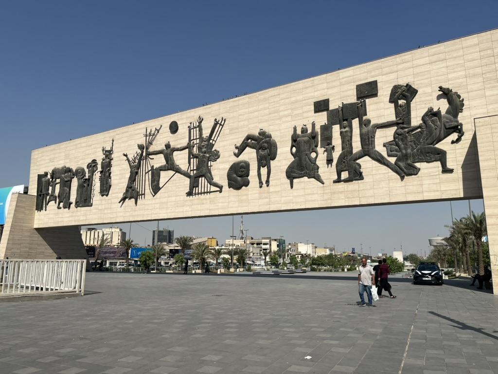 A large sign with a group of people on itAI-generated content may be incorrect.